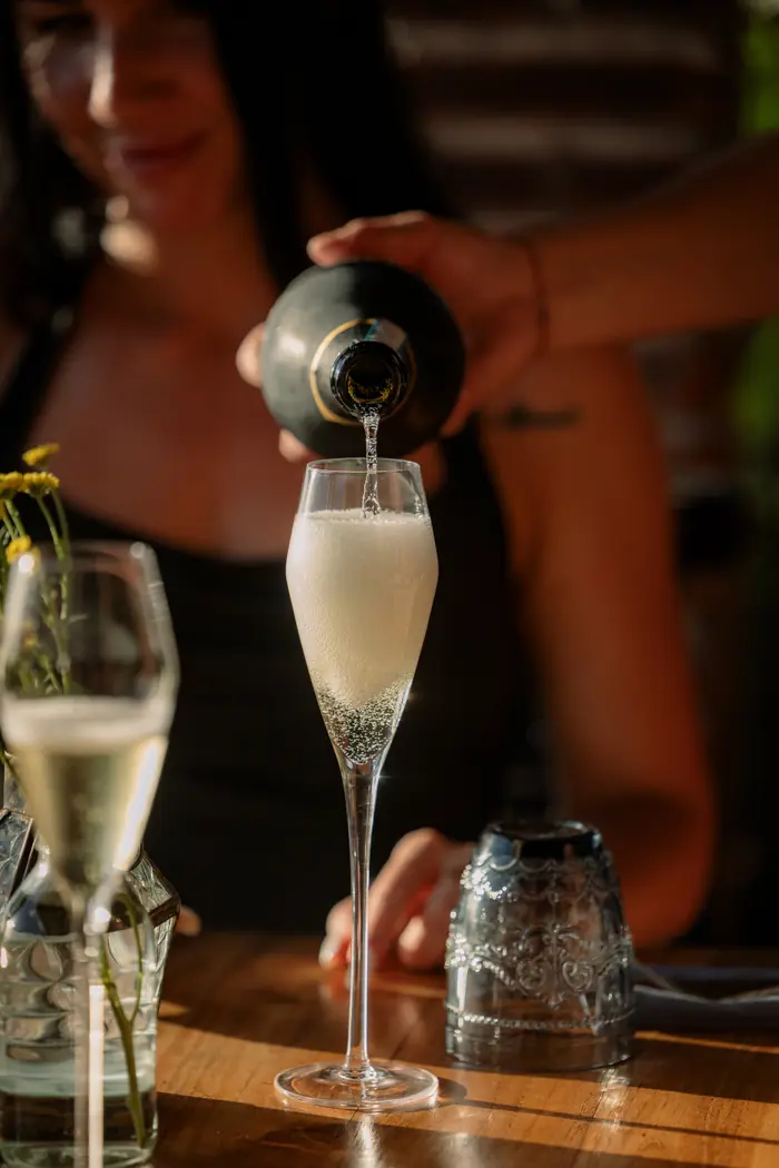 Sparkling wine poured into a glass, Shaffa GastroBazar, Balangan, Bukit