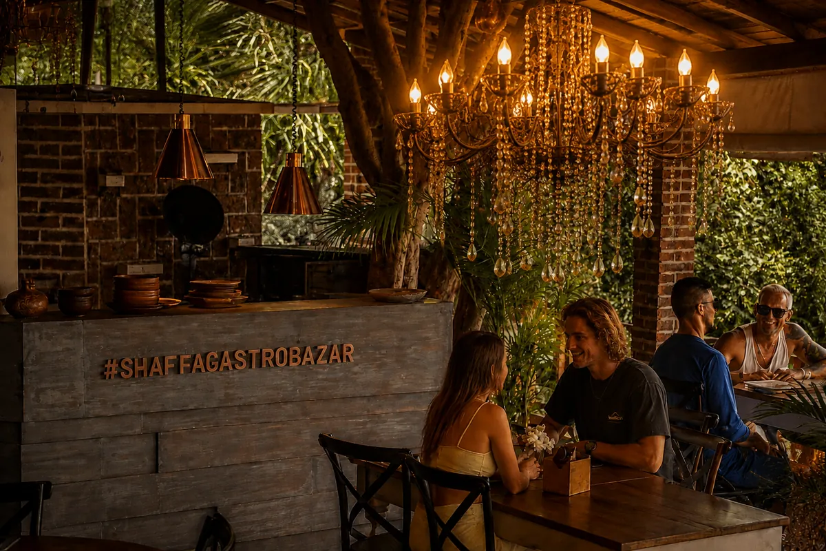 The room: chandelier, copper hoods over the stove, guests at the tables, Shaffa GastroBazar, Balangan, Bukit